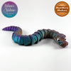 Ball Python Juvenile in Purple+Blue Green+Burnt Orange Shifting