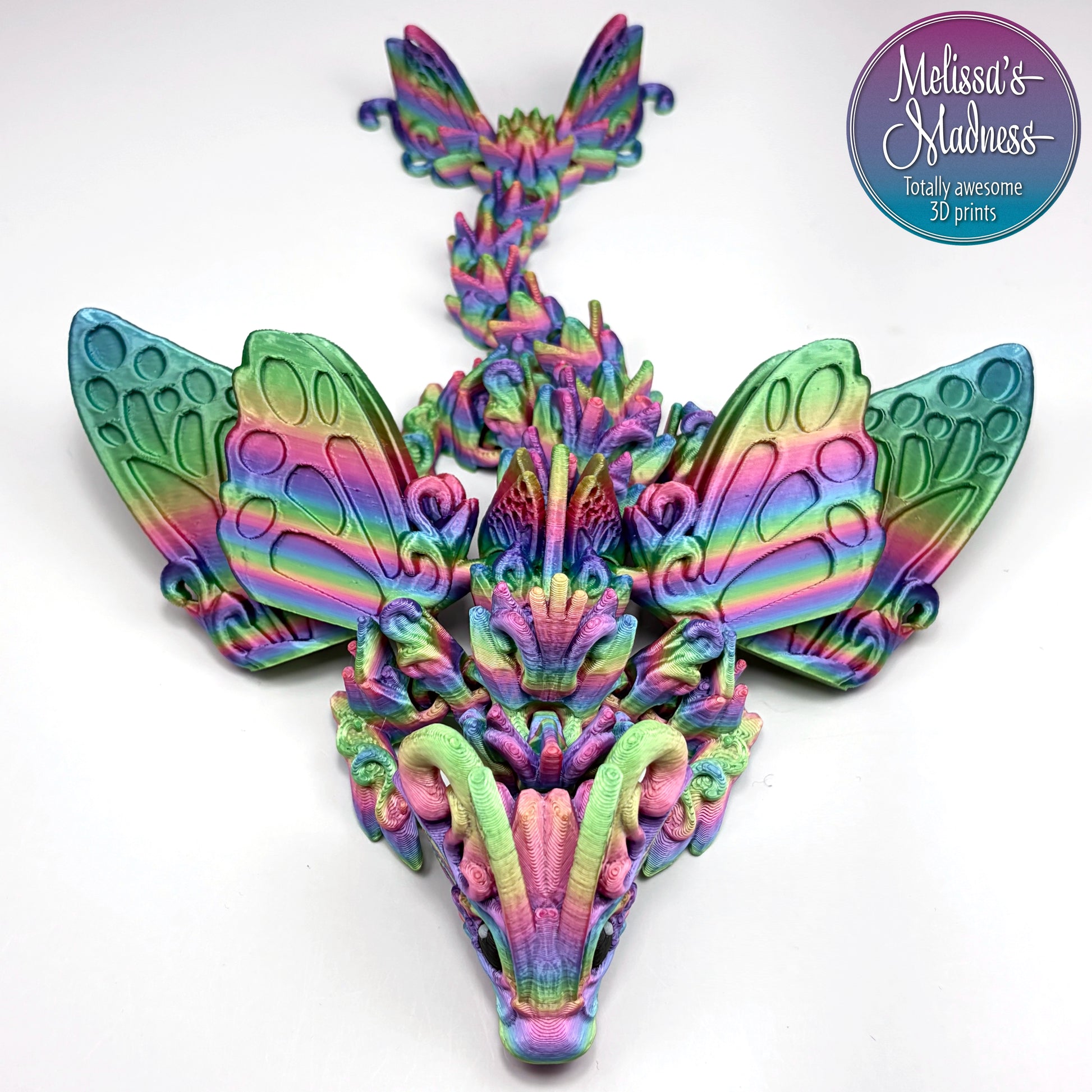 Butterfly Baby Dragon in Candy Rainbow Made in Montana woman-owned handcrafted articulated figurine