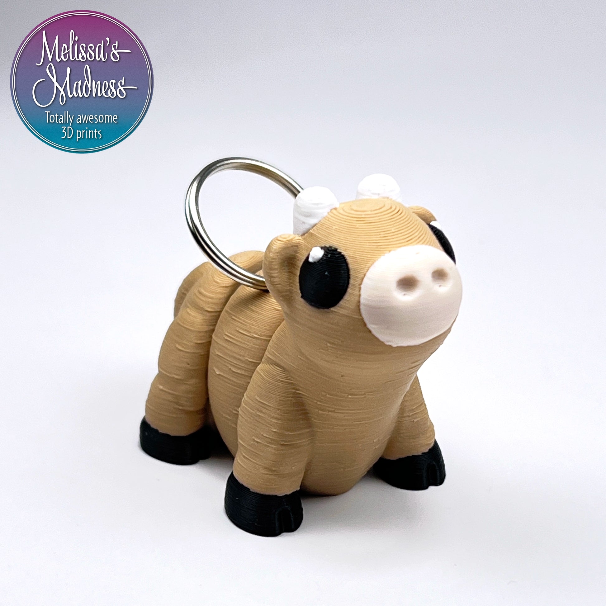 Articulated Cute Cow Chunky Keychain in Latte & Bone PLA Bioplastic Eco-Friendly Model Made with Hydropower