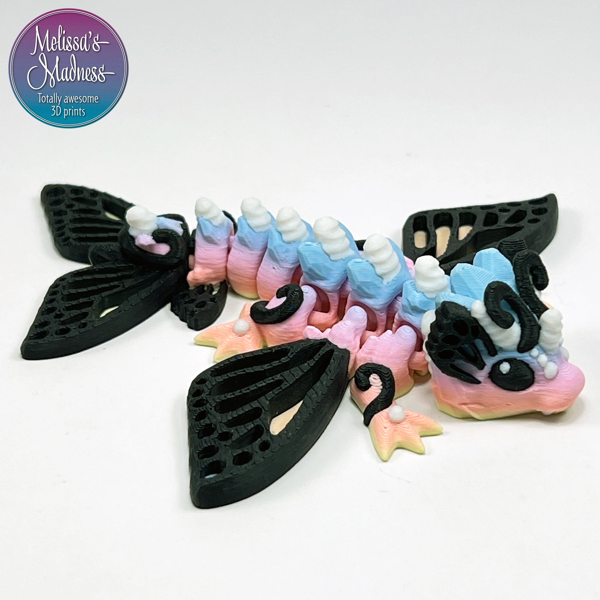 Articulated Tiny Butterfly Wyvern in Pastel Spectrum Handcrafted Made in Montana Small Business 3D Printed