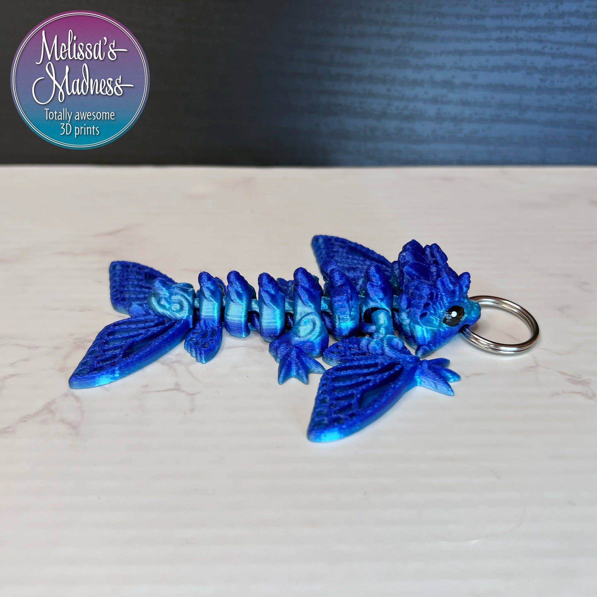 Tiny Butterfly Wyvern Keychain in Ocean