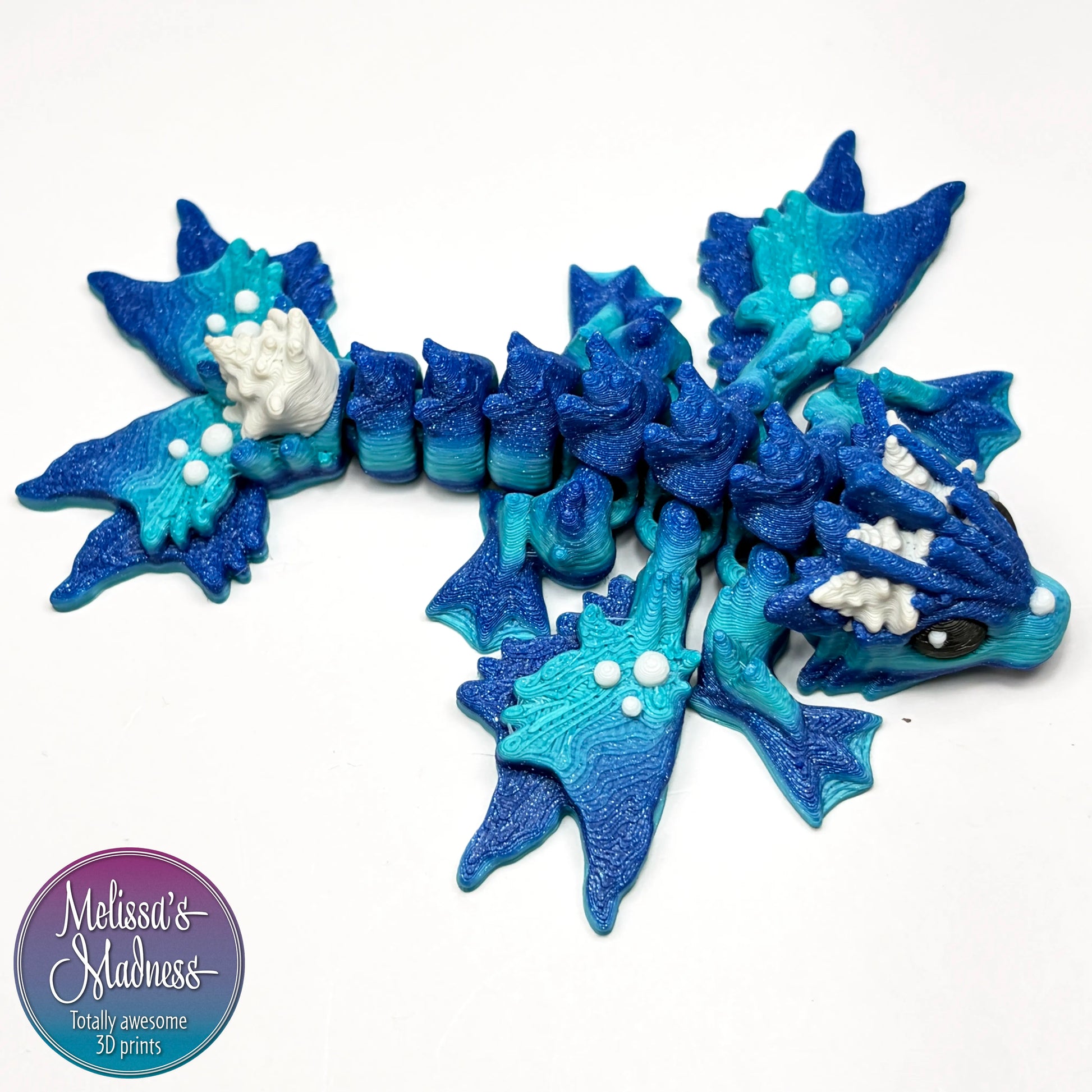 Tiny Ocean Dragon in Ocean & Aged White articulated collectible flexible fidget 3D printed display
