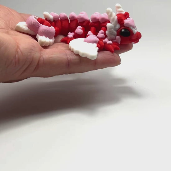 Articulated Tiny Heart Dragon in Red & Petal Pink Handcrafted Made in Montana Small Business Flexibility Demonstration