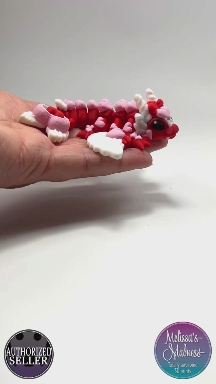 Articulated Tiny Heart Dragon in Red & Petal Pink Handcrafted Made in Montana Small Business Flexibility Demonstration