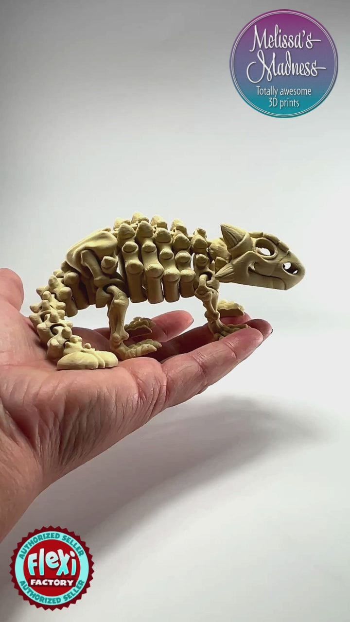 Watch this articulated Ankylosaurus Skeleton 3D printed collectible demonstrate its flexible spine and poseable joints. Made in Montana by Melissa's Madness.