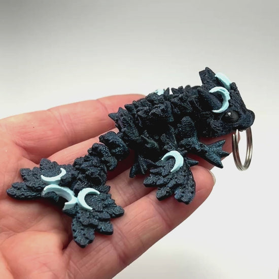 Eco-Friendly Tiny Lunar Dragon Keychain in In the Deep & Ice Blue Flexi Figurine Demonstrating Joint Movement Biodegradable PLA