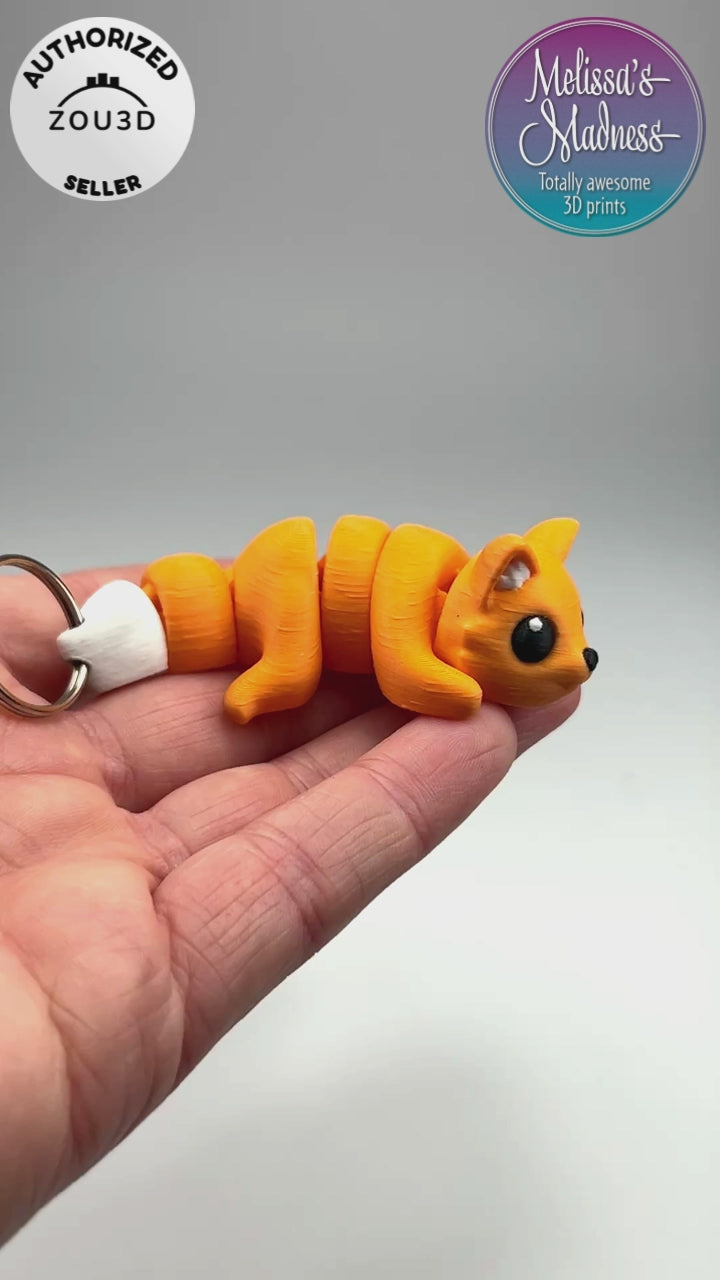 Articulated Cute Fox Chunky Keychain in Mandarin Flexi Fidget Collectible Demonstrating Full Range of Motion 3D Printed