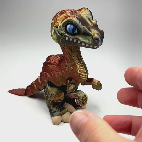 Velociraptor in Gold+Copper+Black Shifting Sustainable Bioplastic 3D Printed Collectible Showing Articulating Movement Industrially Compostable