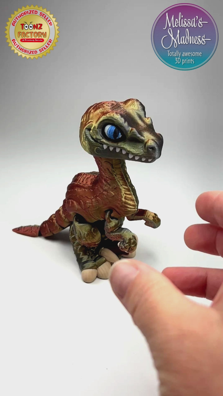Velociraptor in Gold+Copper+Black Shifting Sustainable Bioplastic 3D Printed Collectible Showing Articulating Movement Industrially Compostable
