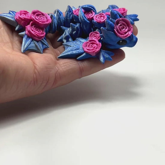 Articulated Tiny Rose Wyvern in Blue+Silver Shifting & Silk Pink Ombre Flexi Fidget Collectible Demonstrating Full Range of Motion 3D Printed