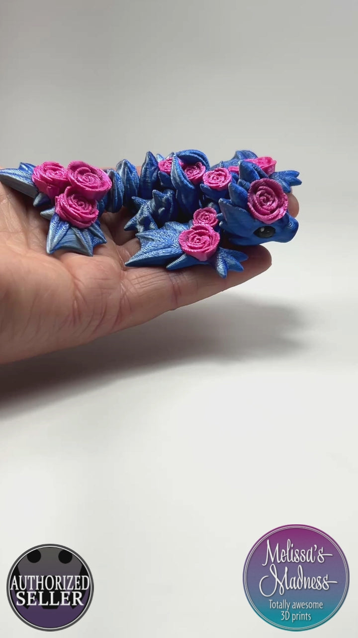 Articulated Tiny Rose Wyvern in Blue+Silver Shifting & Silk Pink Ombre Flexi Fidget Collectible Demonstrating Full Range of Motion 3D Printed