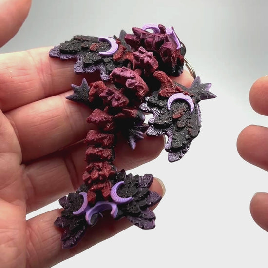 3D Printed Articulated Tiny Lunar Wyvern in Dragon's Lair & Lilac Flexi Collector Item Showing Articulation and Flexibility